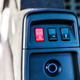 That subtle circular button is the happy go fast button.